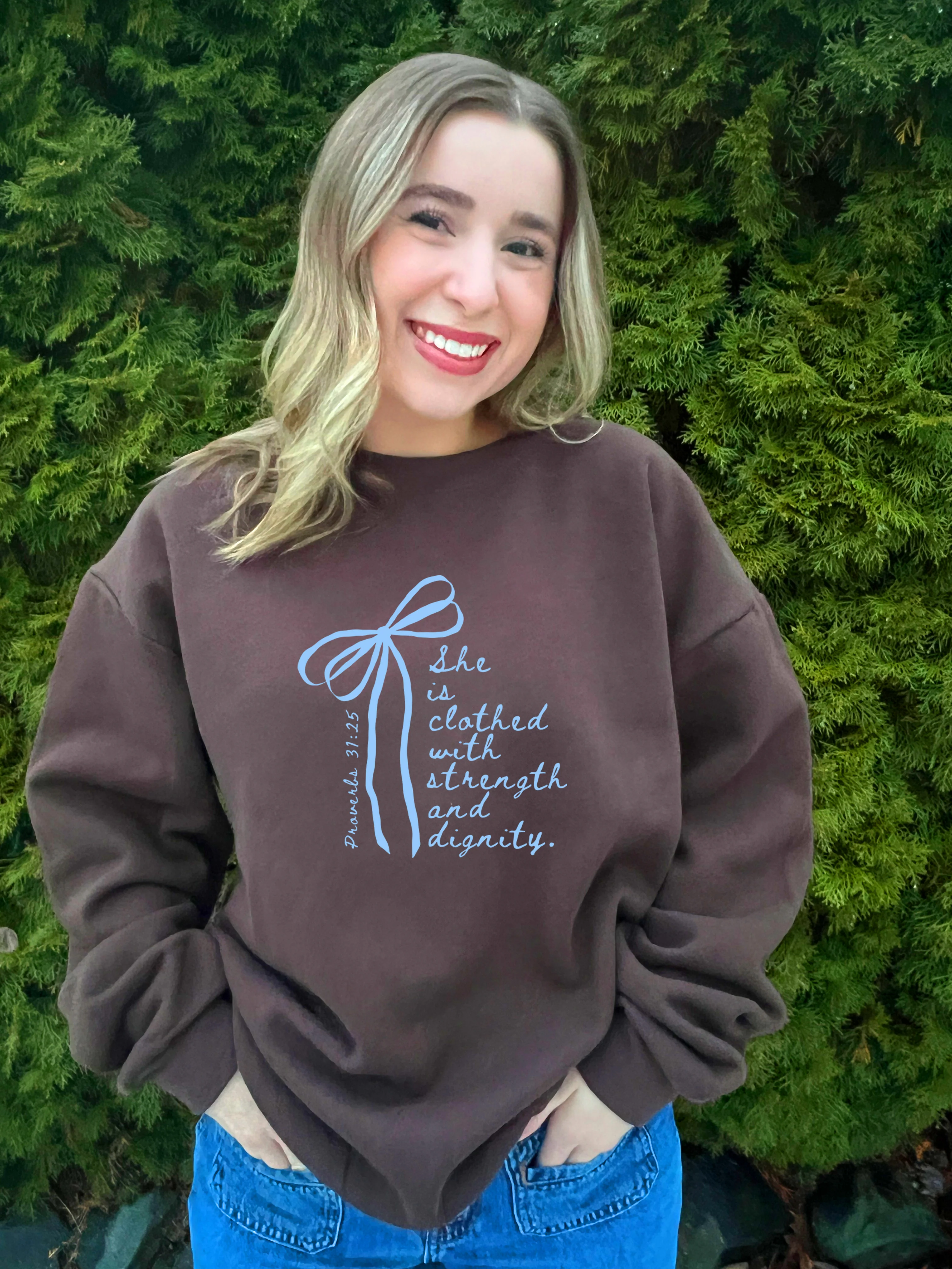 SHE IS CLOTHED WITH STRENGTH AND DIGNITY UNISEX SWEATSHIRT - Image 3