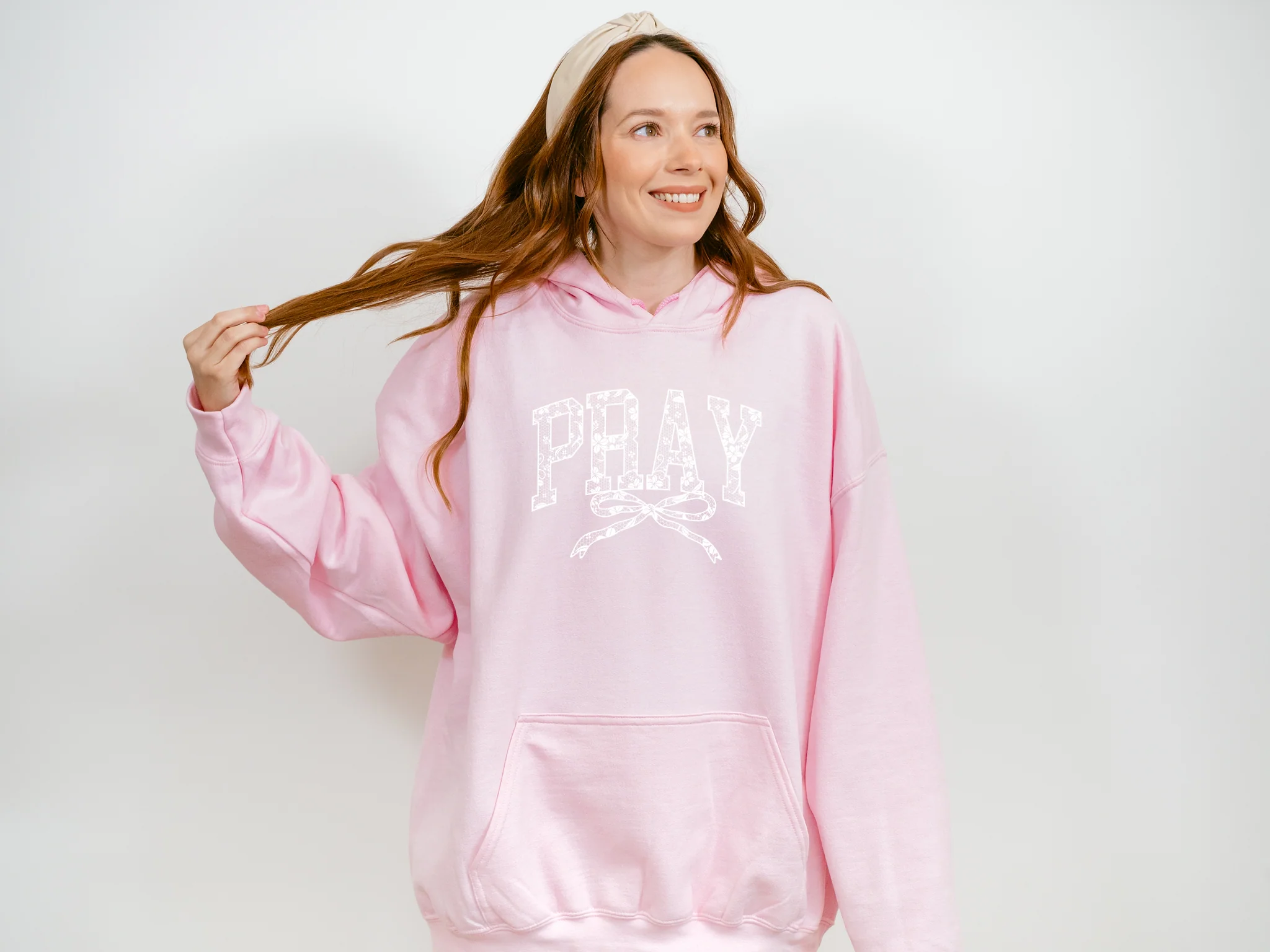 PRAY WITH BOW UNISEX SWEATSHIRT HOODIE - SIZE SMALL IN LIGHT PINK
