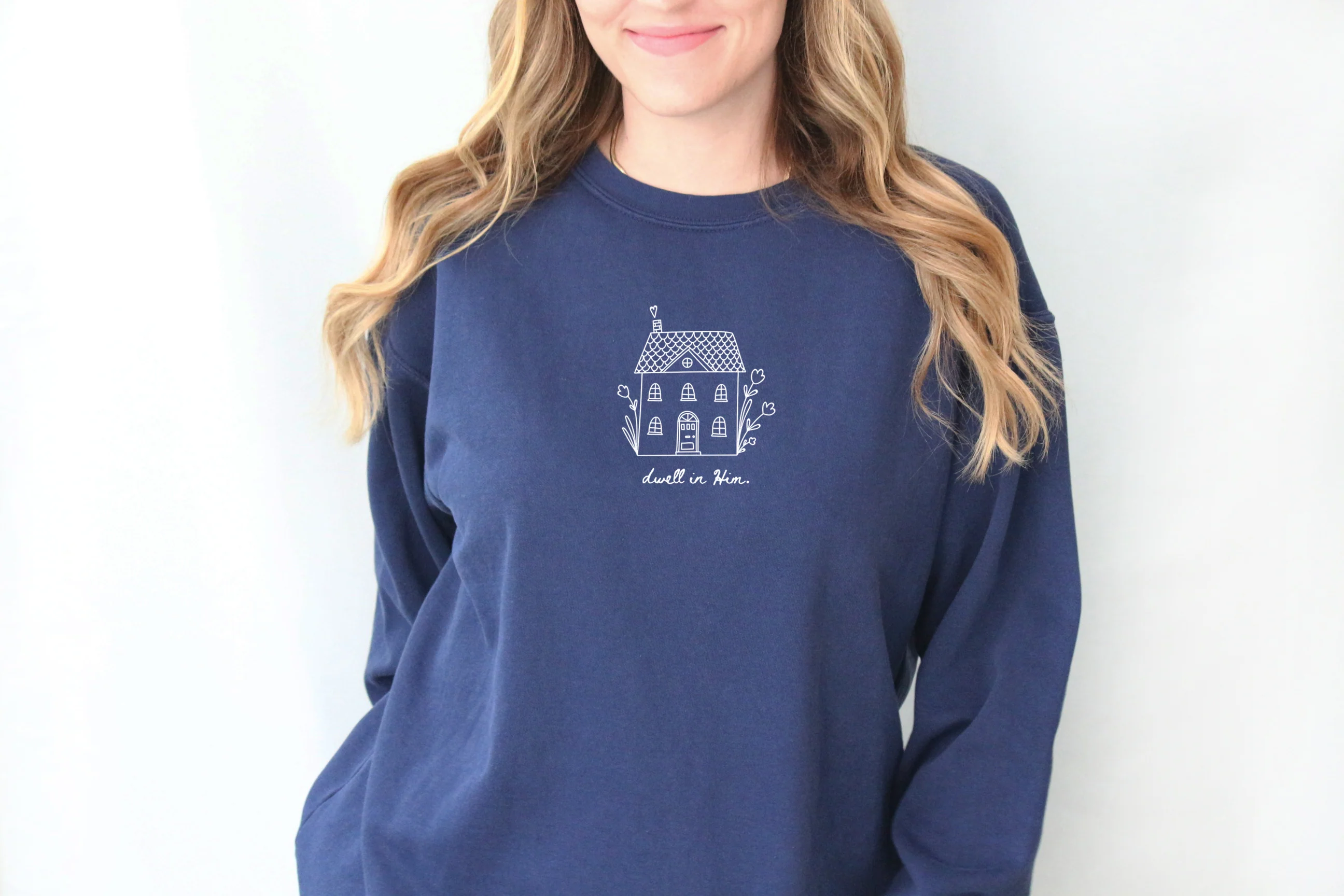 DWELL IN HIM UNISEX SWEATSHIRT